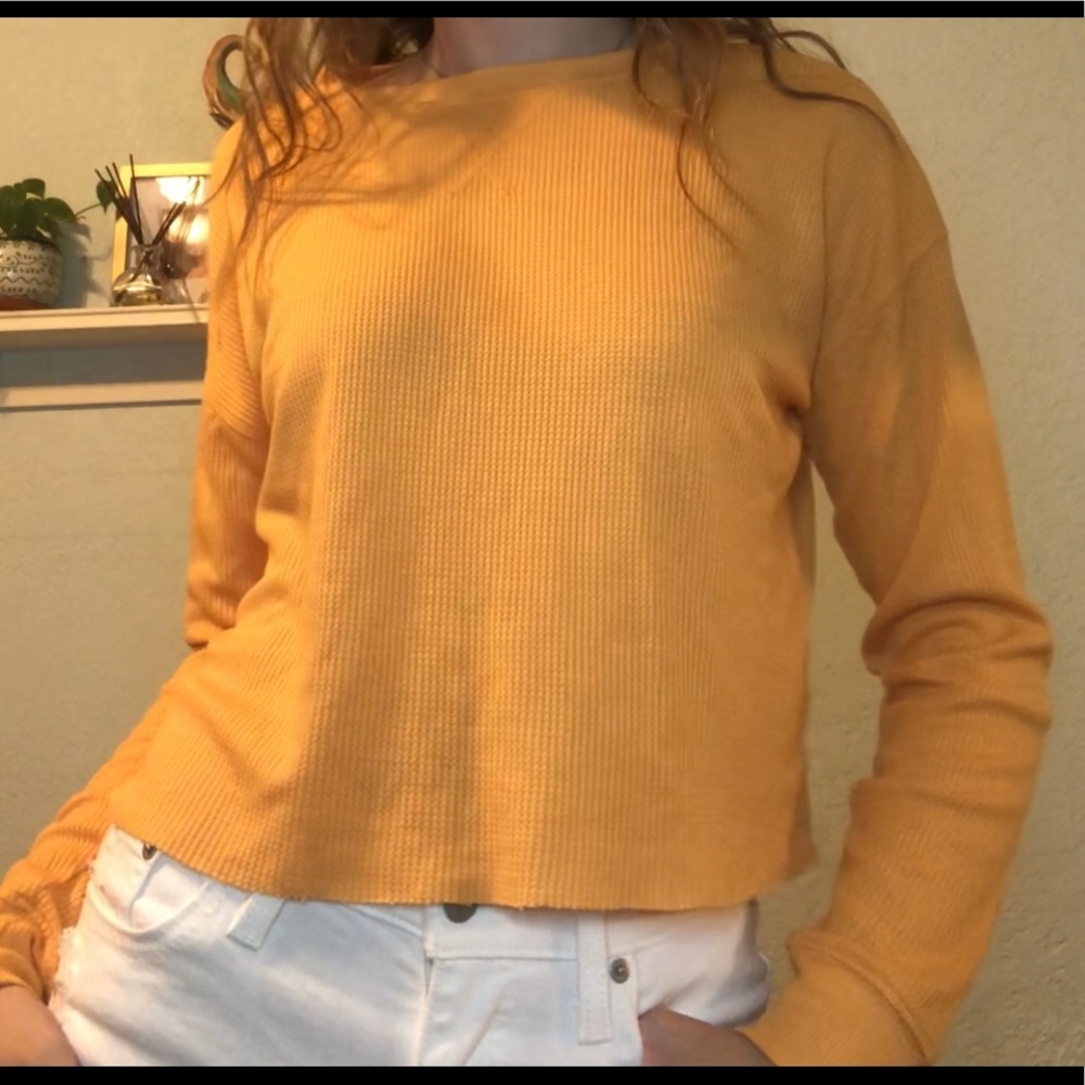 yellow long sleeve shirt